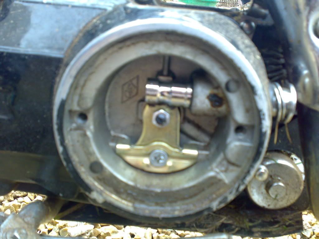 I put it in first and held the clutch in and it locked the wheel. So