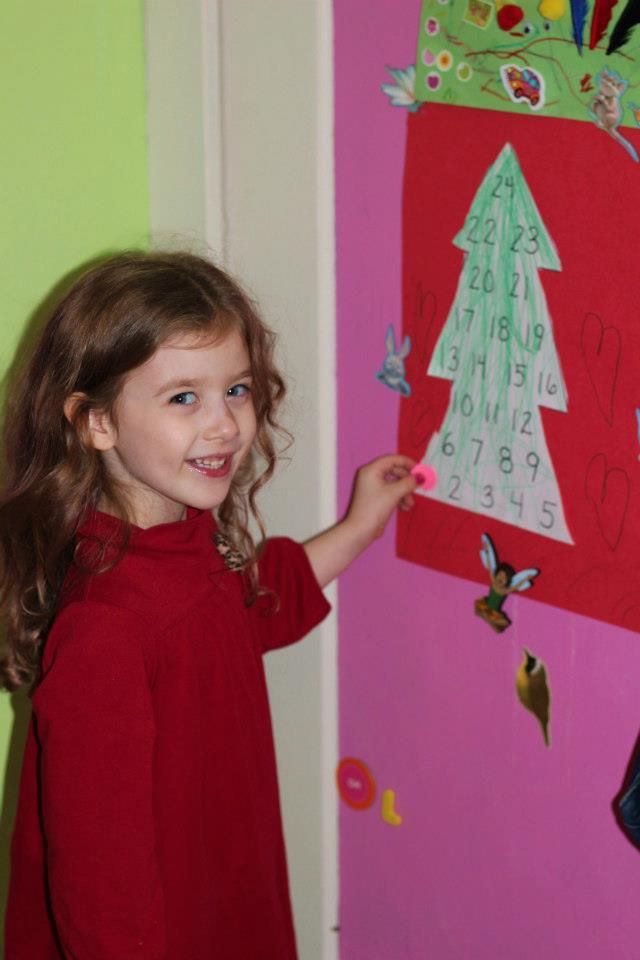 doing her advent calendar she made at school