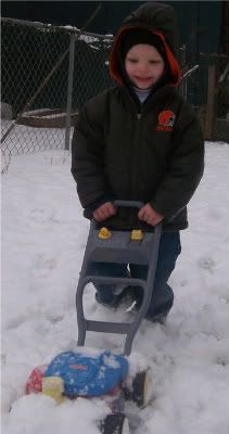 Dynamo helping clear a path with his mower.