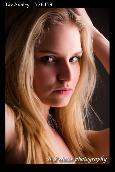 http://i155.photobucket.com/albums/s312/Rogerock/Mayhem/LizAshley-1.jpg